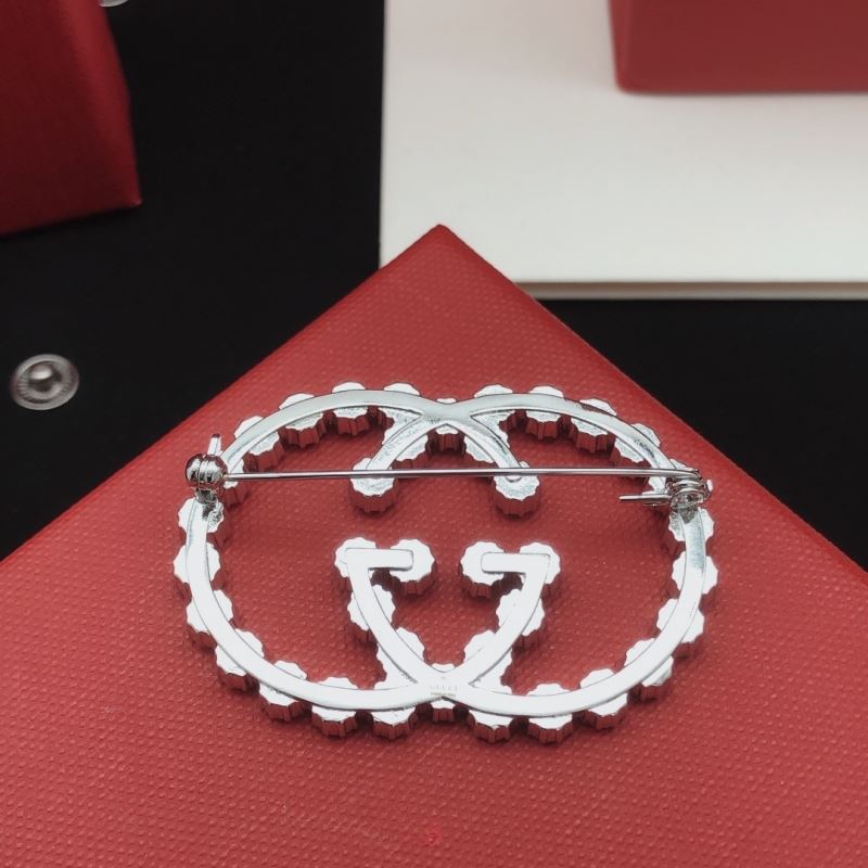Gvc*1 brooches